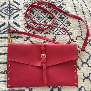 Coral pink crossbody purse from Mango